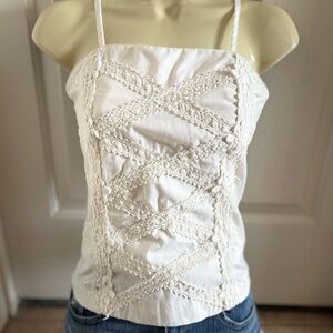 Crop top camisole adjustable spaghetti straps.